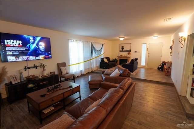 living room featuring dark hardwood / wood-style floors