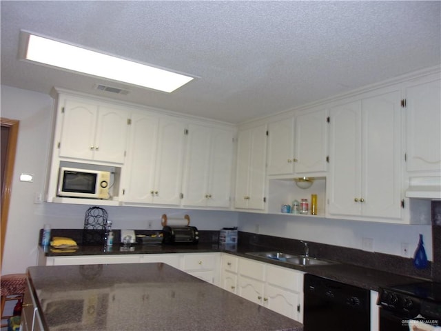 kitchen featuring ventilation hood, sink, black dishwasher, a textured ceiling, and white cabinetry