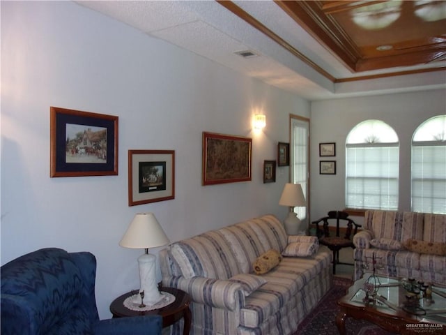 living room featuring crown molding