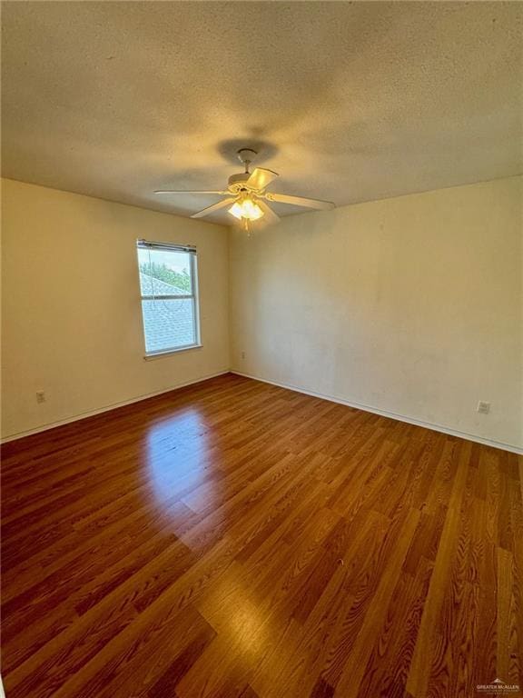 2100 Emory Ave, Mcallen, TX 78504 - empty room with a textured ceiling, wood finished floors, ceiling fan, and baseboards