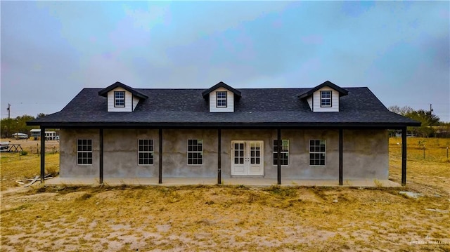 back of property with french doors and a patio area