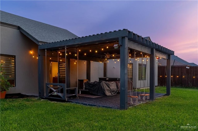 2411 Holland Ave, Edinburg, TX 78539 - back of house with a lawn