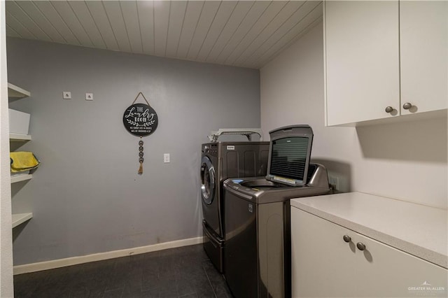 2411 Holland Ave, Edinburg, TX 78539 - washroom with cabinet space, independent washer and dryer, and baseboards