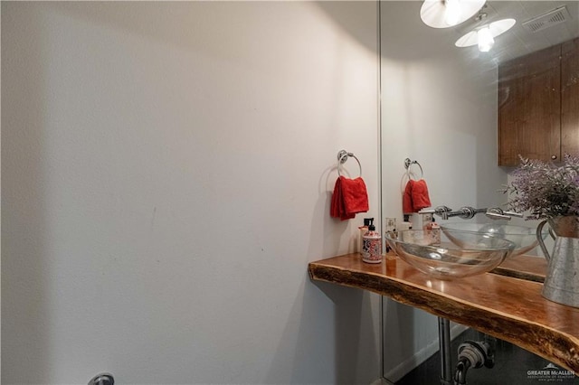 2411 Holland Ave, Edinburg, TX 78539 - bathroom featuring a sink
