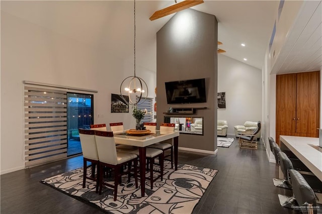 2411 Holland Ave, Edinburg, TX 78539 - dining area with baseboards, a chandelier, dark wood-style flooring, high vaulted ceiling, and recessed lighting