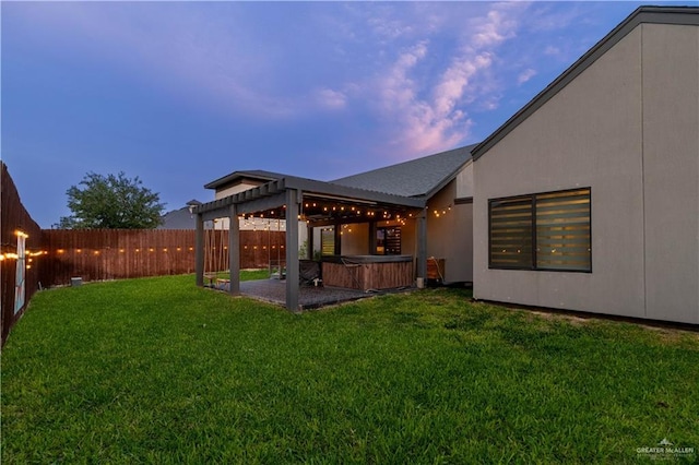 2411 Holland Ave, Edinburg, TX 78539 - view of yard with a hot tub and a patio area