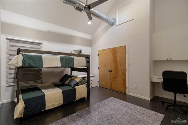 2411 Holland Ave, Edinburg, TX 78539 - bedroom with high vaulted ceiling, baseboards, wood finished floors, and ceiling fan