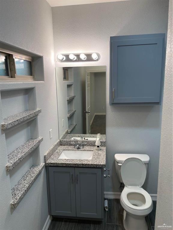 2705 Primrose Ave, Edinburg, TX 78541 - bathroom with vanity and toilet