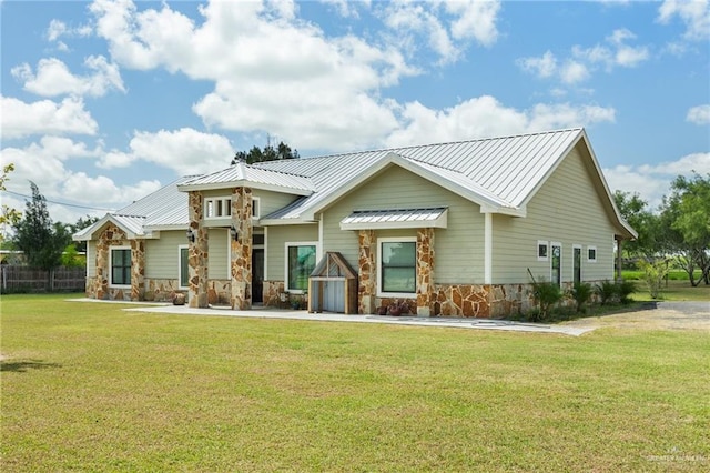 view of front of home with a front lawn