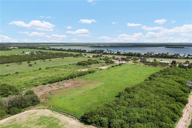 bird's eye view with a water view and a rural view