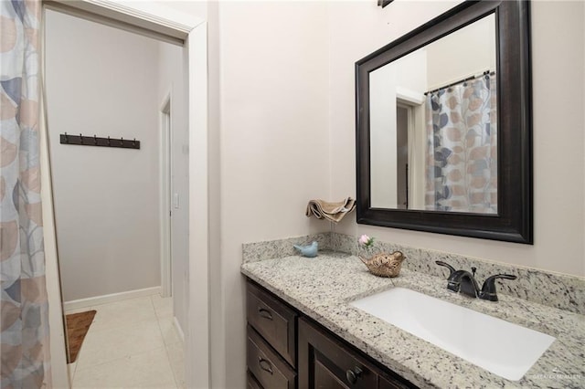 bathroom with vanity and tile patterned floors