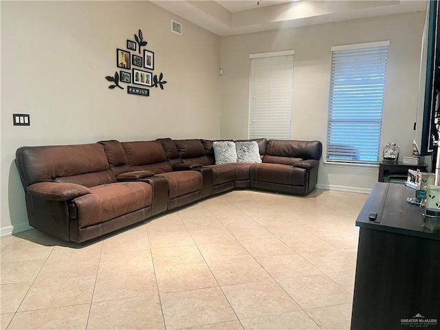 living room featuring light tile patterned flooring