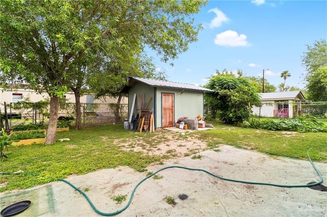 1600 Pullin Ave, San Juan, TX 78589 - view of yard featuring an outdoor structure