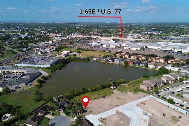 bird's eye view with a water view
