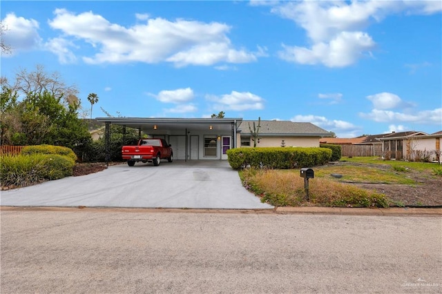 5618 Jack Nicklaus Dr, Palm Valley, TX 78552 - view of front of house with a carport and concrete driveway