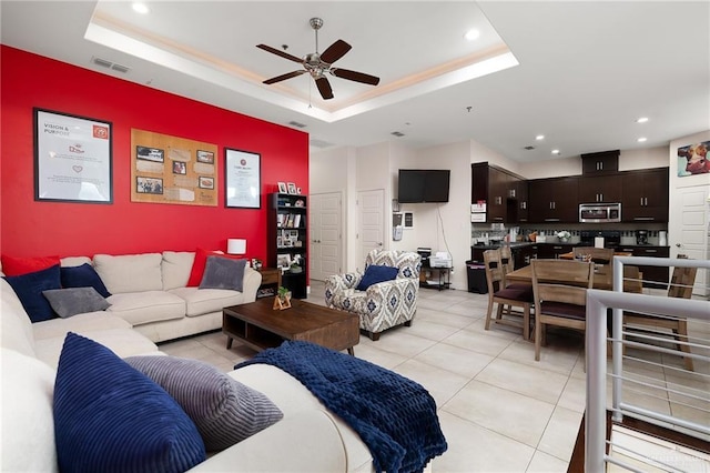 3011 S L Ln Unit B, Mcallen, TX 78503 - living room featuring ceiling fan, a tray ceiling, light tile patterned flooring, and recessed lighting