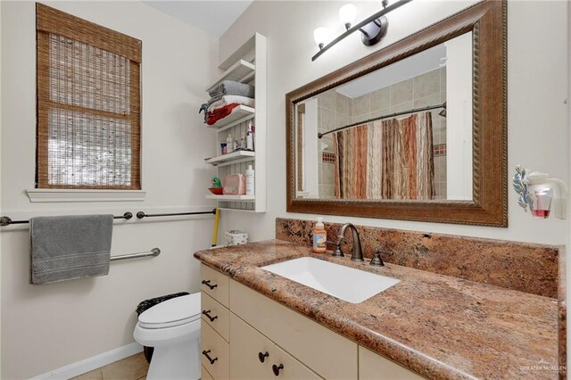 1205 Susan Dr, Edinburg, TX 78539 - full bathroom with vanity, curtained shower, baseboards, toilet, and tile patterned flooring