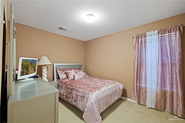 3155 Obsidian Dr, Brownsville, TX 78526 - bedroom featuring light carpet