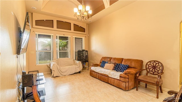 2904 Victoria St, Hidalgo, TX 78557 - living room featuring a chandelier, light tile patterned floors, and a towering ceiling