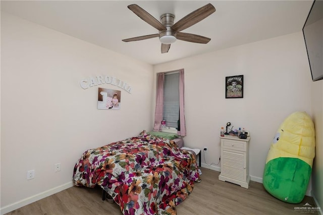 1448 W B St, Mission, TX 78572 - bedroom with wood finished floors and a ceiling fan