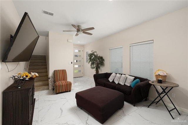 1448 W B St, Mission, TX 78572 - living room with light marble finish floors, ceiling fan, stairs, and recessed lighting