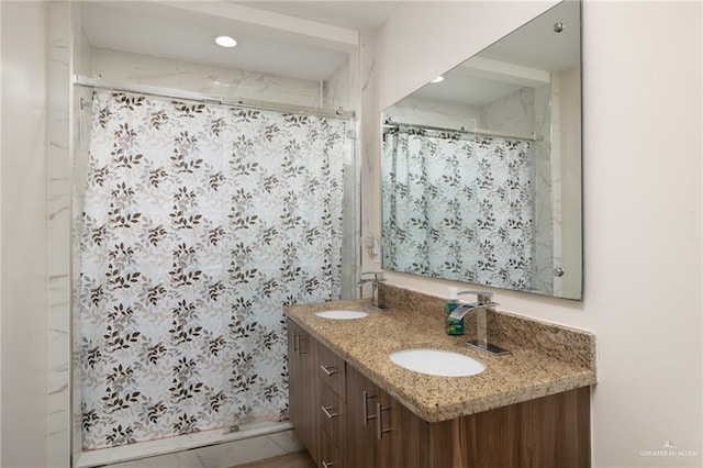 1448 W B St, Mission, TX 78572 - bathroom with double vanity, a shower stall, and recessed lighting