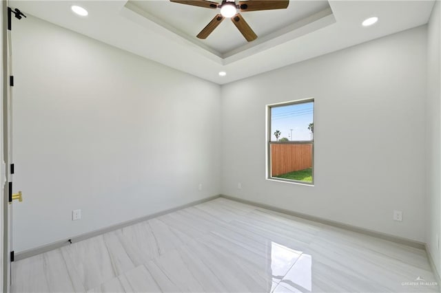 spare room featuring recessed lighting, baseboards, and ceiling fan