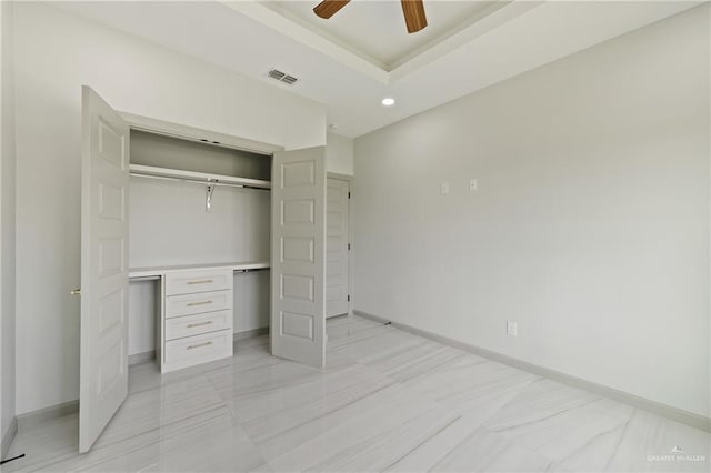 unfurnished bedroom with baseboards, a closet, recessed lighting, and visible vents