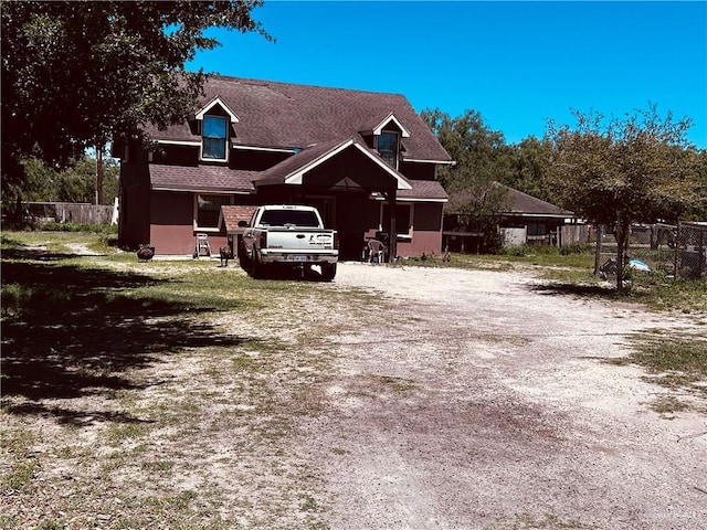2314 Naranja Dr, Mission, TX 78574 - view of front of home featuring fence and dirt driveway
