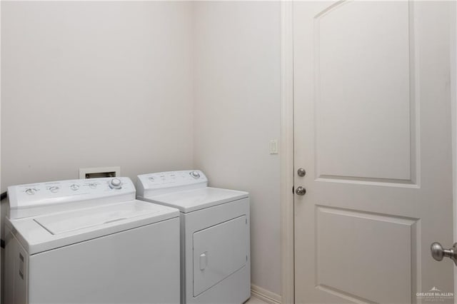 washroom with washer and clothes dryer