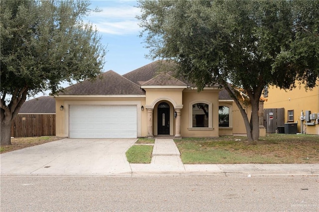 view of front of property with a garage