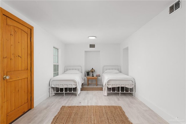 bedroom featuring light hardwood / wood-style flooring