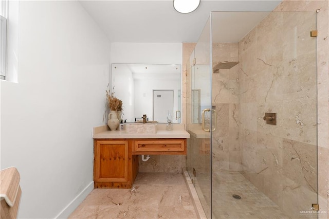 bathroom with vanity and walk in shower