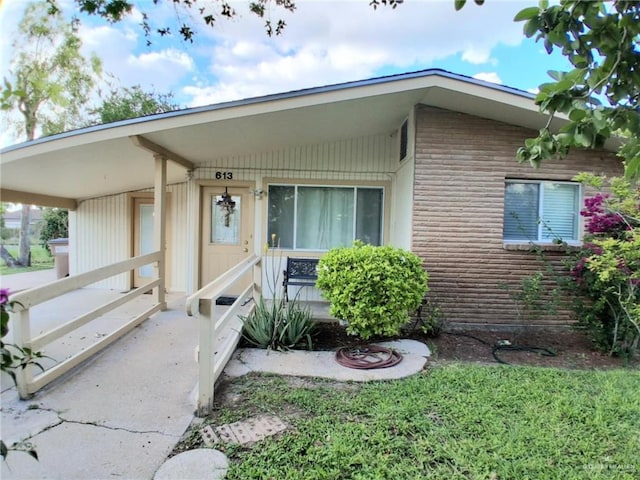613 W Sprague St, Edinburg, TX 78539 - view of front facade featuring brick siding