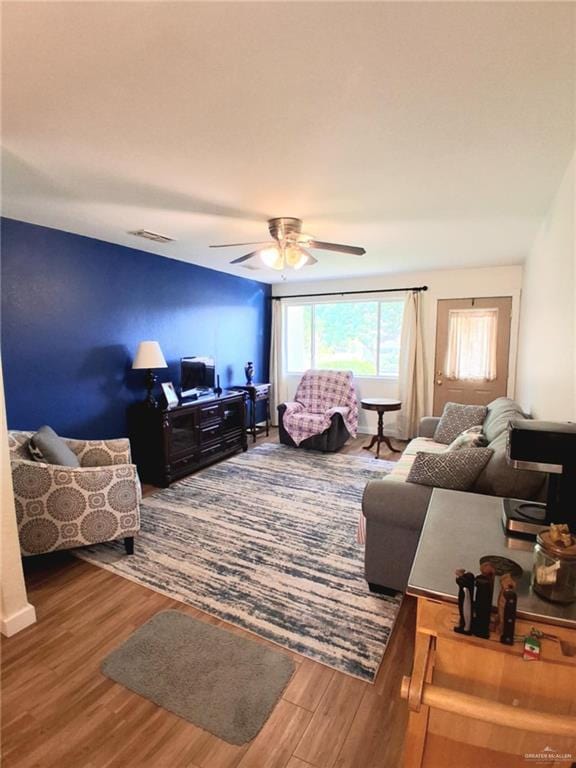 613 W Sprague St, Edinburg, TX 78539 - living room with wood finished floors and ceiling fan