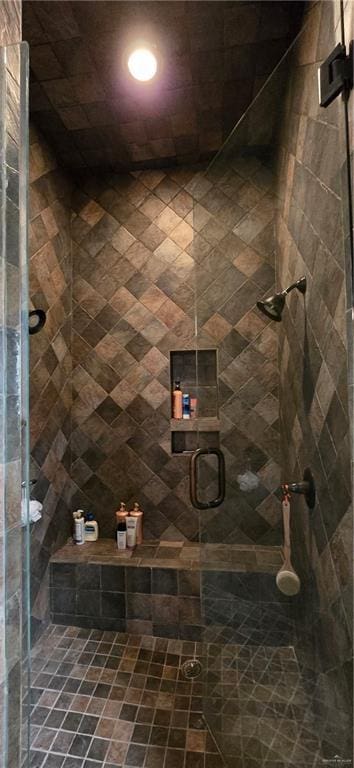 full bathroom featuring a shower stall