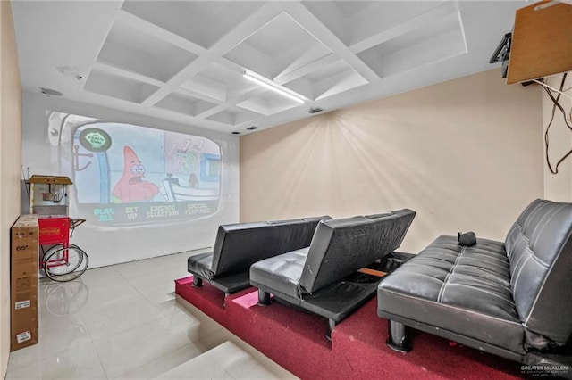 cinema featuring light tile patterned floors and coffered ceiling