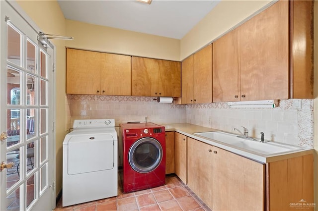 27101 N State Highway 345, San Benito, TX 78586 - washroom featuring cabinet space and washer and clothes dryer
