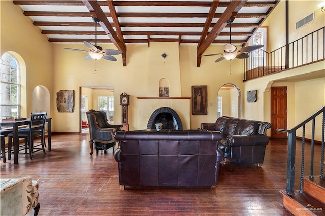 27101 N State Highway 345, San Benito, TX 78586 - living area with ceiling fan, beamed ceiling, plenty of natural light, a towering ceiling, and dark wood-style floors