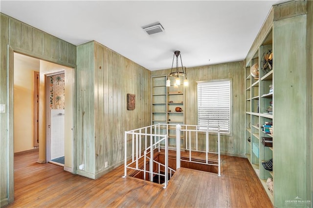 27101 N State Highway 345, San Benito, TX 78586 - dining area with wood walls and wood finished floors