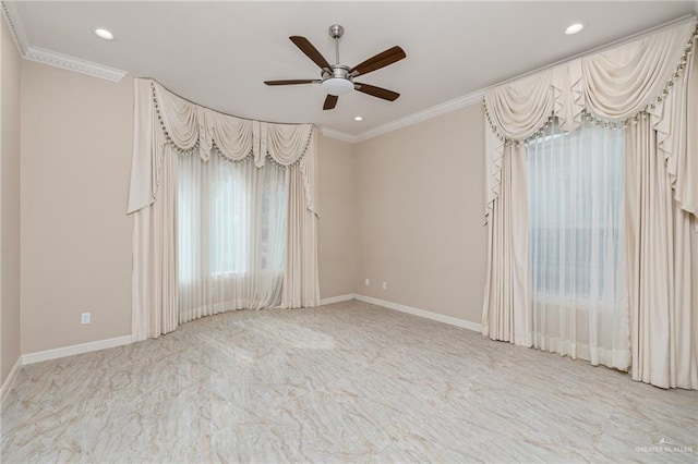 empty room featuring ceiling fan and crown molding