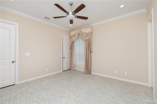 unfurnished room with ceiling fan and crown molding