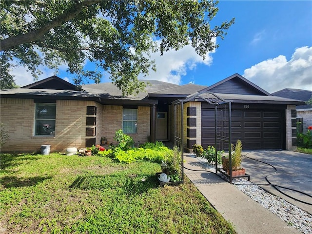 single story home featuring a front yard and a garage