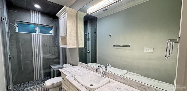4609 Resaca N St, Harlingen, TX 78552 - bathroom featuring a stall shower, vanity, and ornamental molding