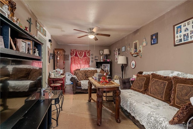 living room featuring a ceiling fan