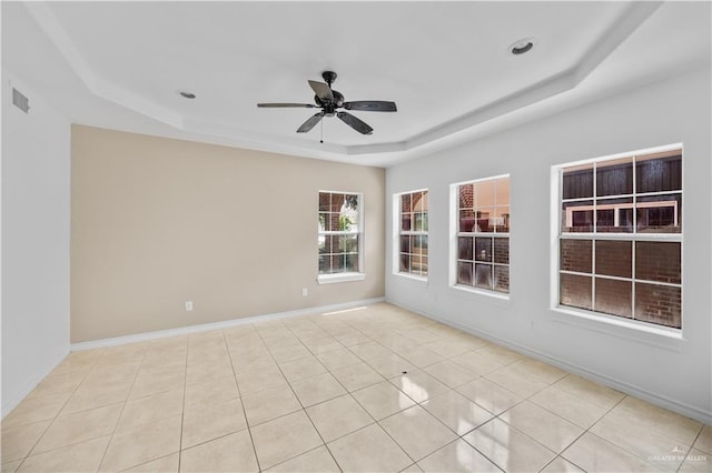 4317 N 5th St, Mcallen, TX 78504 - unfurnished room featuring a tray ceiling, ceiling fan, and tile patterned flooring
