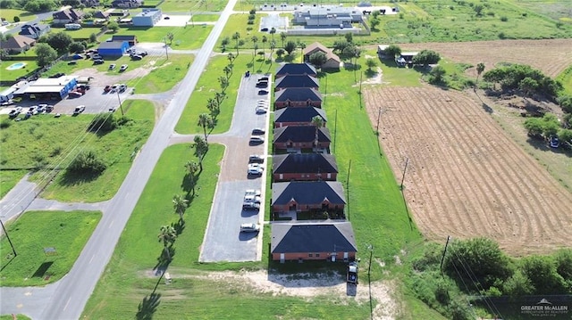 birds eye view of property featuring a rural view