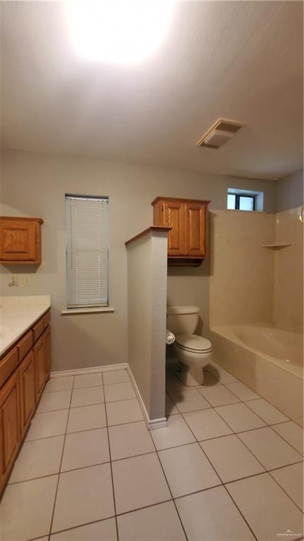 full bathroom with tile patterned floors, vanity, toilet, and bathtub / shower combination