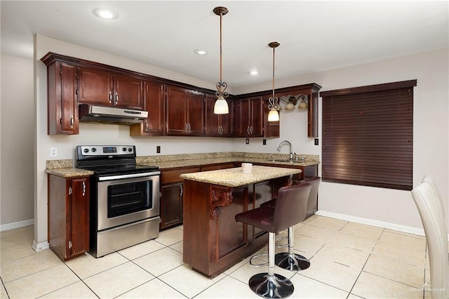 kitchen featuring sink, electric stove, light tile patterned floors, a kitchen island, and hanging light fixtures