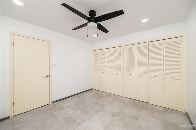 2115 S 3rd St, Mcallen, TX 78503 - unfurnished bedroom with multiple closets, recessed lighting, and ceiling fan